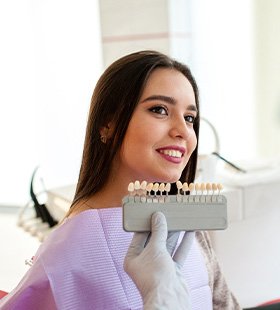 Female patient learning the cost of teeth whitening in Delafield