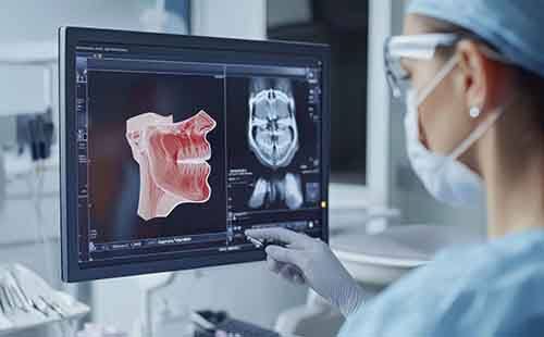 Dental professional reviewing patient for myofunctional therapy in Delafield