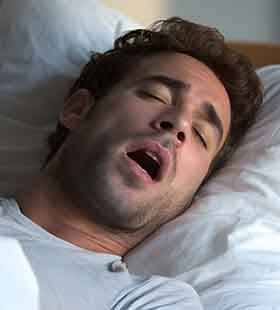 Man sleeping with mouth open