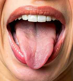 Up-close view of person sticking out their tongue