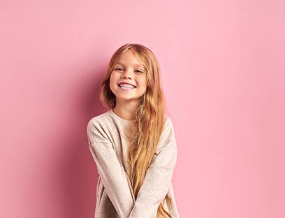 Little girl showing off her healthy and beautiful smile