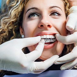 Male patient meeting with dentist for routine check-in