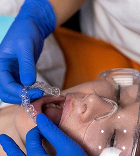 Teenager undergoing an Invisalign Teen fitting