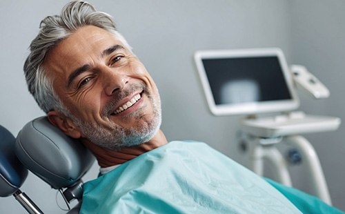 Man after being treated for a failed dental implant in Delafield