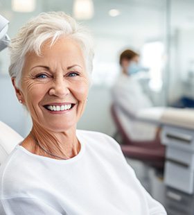 Woman after receiving dental implant salvage in Delafield